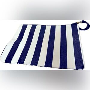 Betsy Johnson- Striped wristlet with pompom.